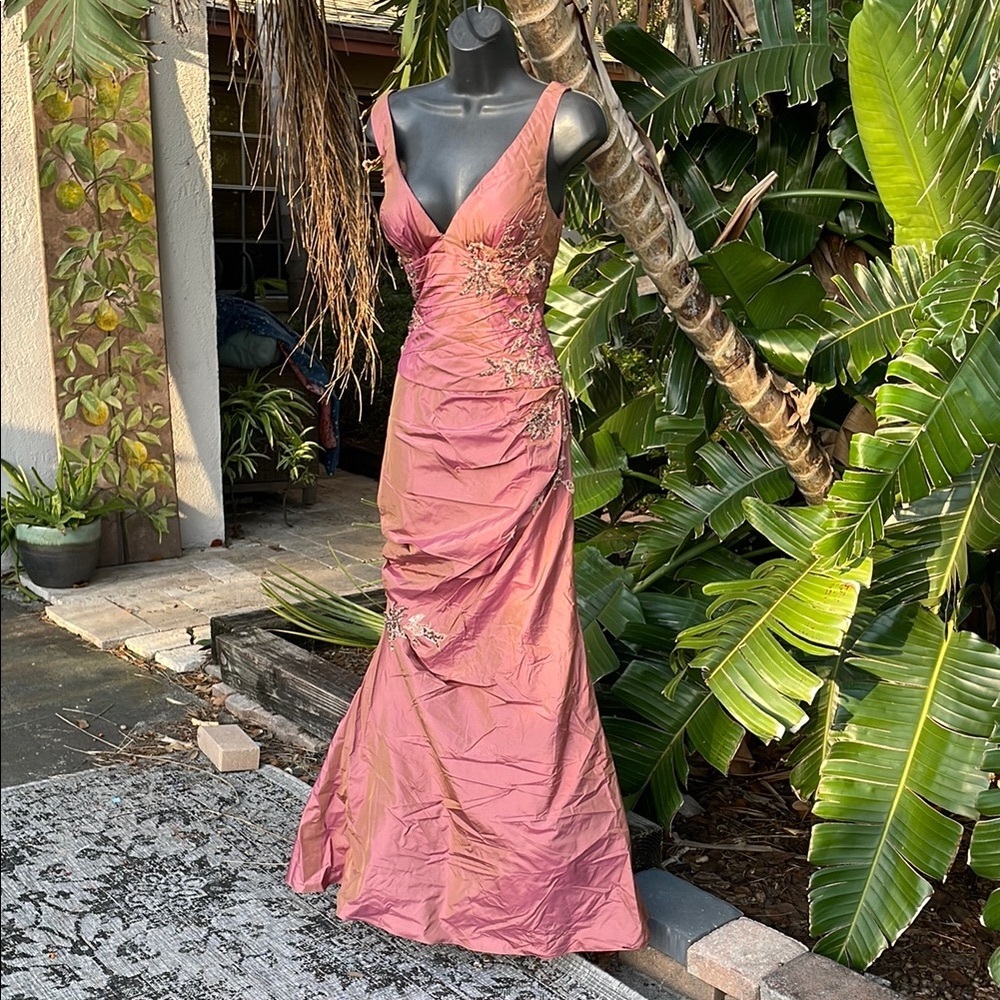 La femme iridescent, pink satin trumpet gown